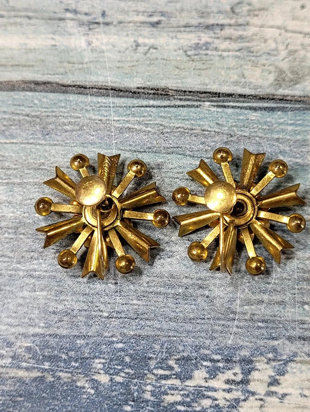 Gold Starburst Brooch and Earring Set with Red Rhinestones
